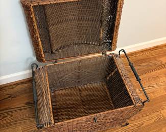 R15 - $25. Medium Sized Wicker Lidded Storage Box. Measures 25" x 15" x 22" tall. Good Condition.