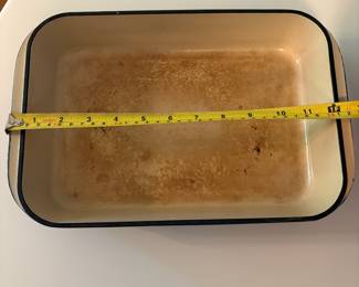 R58 - $30. Le Creuset Rectangular Roaster. See photos for inside damage.