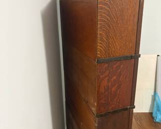R29 - $500. Globe-Wernicke 4 Stack Barrister Bookcase. Bottom panel has a crack in the glass. Measures 34" wide x 11" deep x 67" tall.