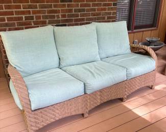 R5 - $600. Ebel Avignon Wicker Outdoor Sofa with cushions. Excellent Condition. Kept on covered screened porch. Measures 76" wide x 35" deep x 33" tall. Floor to seat is 17".