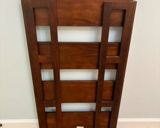 R24 - $25. Folding Bookshelf. In good condition. Measures 22" x 18" x 38" tall.