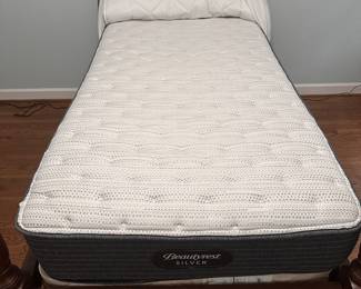 R23 - $50. Wooden Twin Bed Frame. Has some minor damage on the side rails. CLEAN twin mattress & box spring included if you want them!