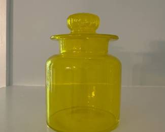 R8 - $40. Vintage Takahashi Apothecary Jar with daisy lid. Citron Yellow. Measures 6" tall to top of lid.