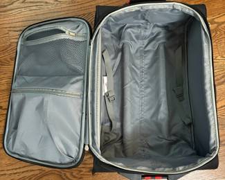 R14 - $10. American Tourister Carry On. Measures 14" x 9" x 22". 2 wheels - not spinners. In good used condition.