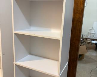 R46 - $15. Small White finished 5 shelf bookcase. Measures 15.5" wide x 9.25" deep x 52" tall. Shelves are NOT adjustable.