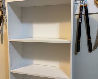 R44 - $20. White finished 5 shelf bookcase. Measures 25" wide x 9.5" deep x 71.5" tall. Shelves are adjustable. Has been in a garage.
