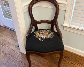 R38 - $40. Antique Chair with embroidered seat. Fair condition - seat is warped, frame is in great shape. Measures 19" wide x 19" deep x 36" tall. Floor to seat is 18".