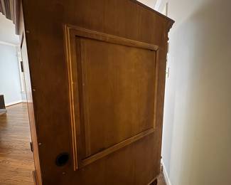 R25 - $60. Entertainment Armoire in Excellent Condition. Has outlets inside. Measures 46" x 26" x 67" tall.