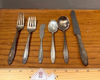 S1 - $3,200 Buy It Today Price. OR highest offer by Friday Morning 9AM. International Sterling "Prelude". 1322 Grams of Sterling + 4 Oz. Knife Handles. 8 - Knives, Spoons, Butter Knives. 2 Soup Spoons. 7 Dinner Forks. 6 Salad Forks. 3 Serving Spoons. STERLING WILL NOT BE AT THE HOME. IT WILL BE SOLD PRIOR TO OPENING.