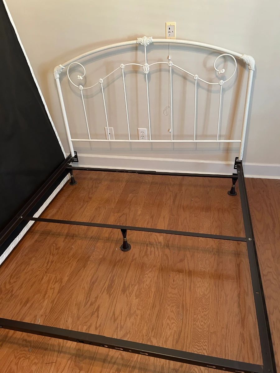 #002	Queen size iron headboard. Painted white	 $75.00 