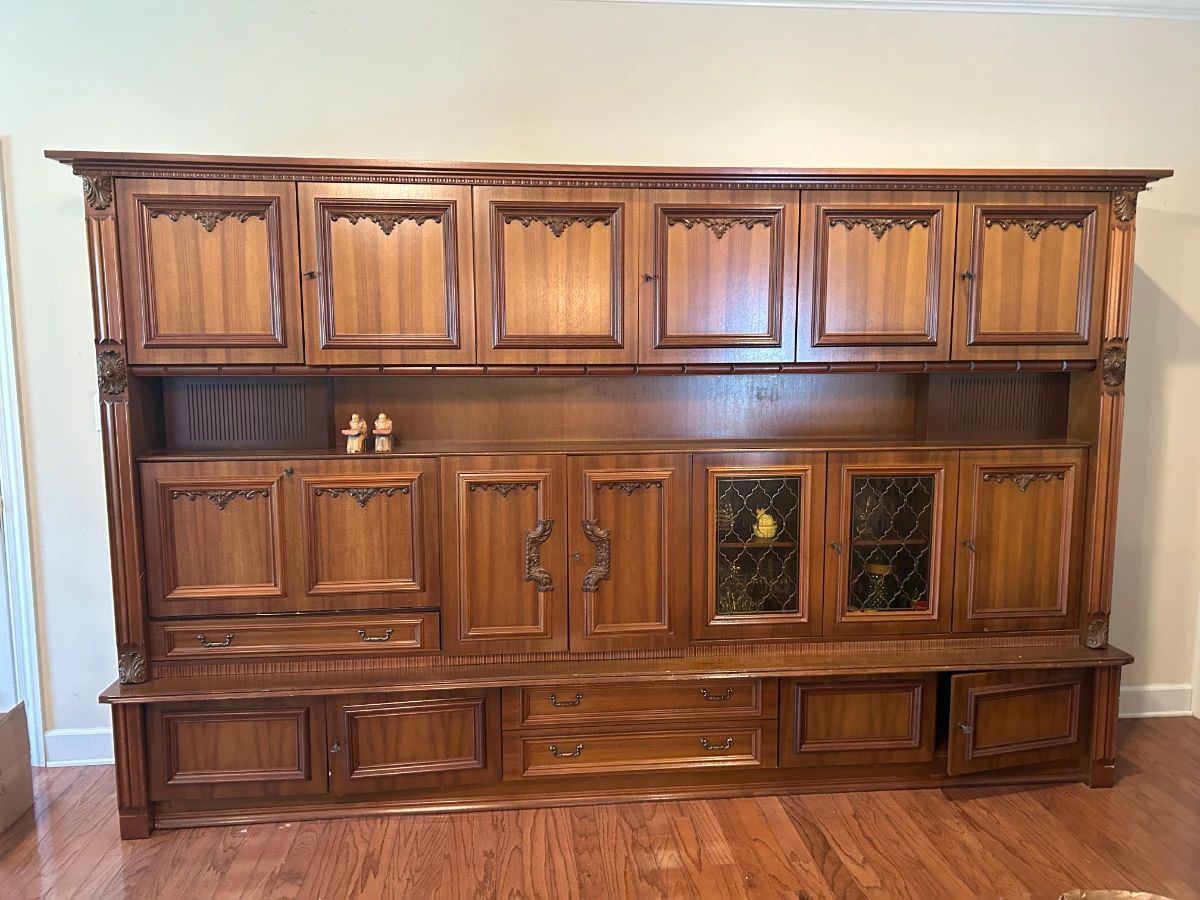#001 German Shrunk 15 Doors, 3 drawers, 1 flip down bar area, 7 keys. Light. 4 pcs. YOU MOVE. 102x21x80" $125.00