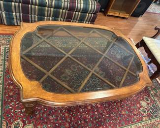 #029 Beveled glass top coffee table 36x51x19" $100.00