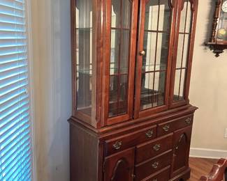 #007 Broyhill China cabinet. 1 glass door, 2 glass interior shelves, 2 wood doors, 5 drawers. 2 pcs Lighted. 52x18x83" $175.00