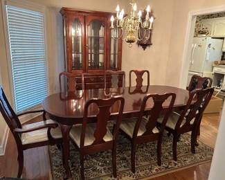 #006 Dining room table. Broyhill. 62-92x42x29" w 8 chairs w upholstered seat w plastic protective cover $275.00
