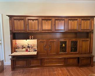 #001 German Shrunk 15 Doors, 3 drawers, 1 flip down bar area, 7 keys. Light. 4 pcs. YOU MOVE. 102x21x80" $125.00
