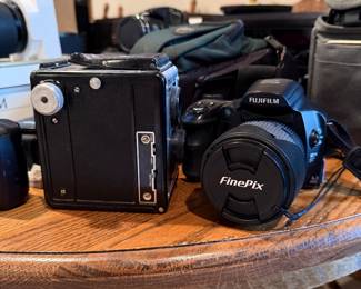 vintage Spartus Full-Vue camera & Fujifilm FinePix S6000fd digital camera