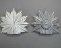 Two Brunswick Officer Dress Star Components