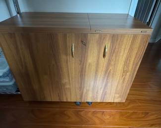 Vintage Sewing Machine Cabinet with Fold-Out Table