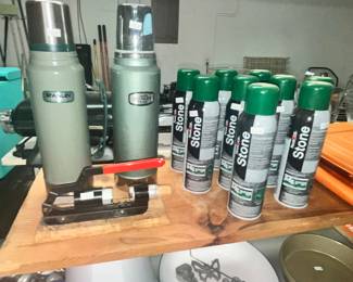 THERMOSES & NUMEROUS CANS OF STONE COUNTERTOP CLEANER
