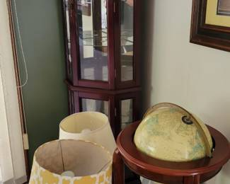 Corner cabinet, lamps and globes 