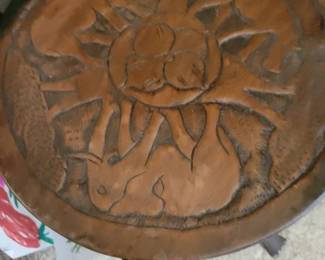 Small carved table with elephants 