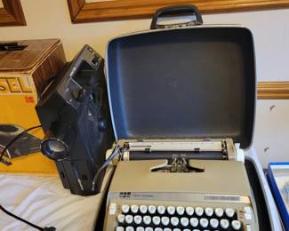 Typewriter.  Carousel projector 