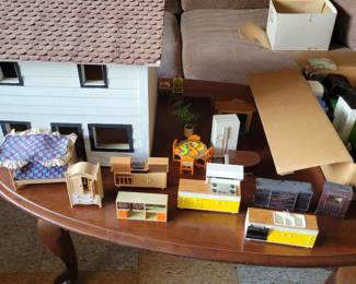 Vintage doll house.  Lots of doll house furniture 