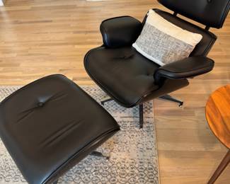 Black Leather Swivel Lounge and Ottoman