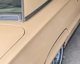 One small scratch on rear right side.