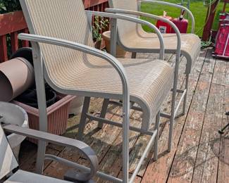 2 patio chairs taller for bar