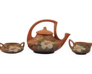 A Trio of Roseville Pottery Magnolia Pattern Tableware Items