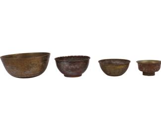 A Group of Four Decorative Metal Bowls of Mixed Origins