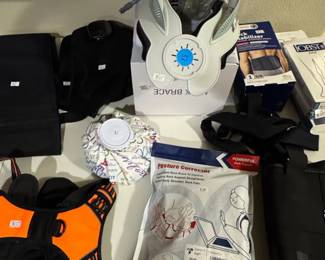 Assorted Medical Braces and Supports, including Cervical Collar, Posture Corrector, and Back Stabilizer