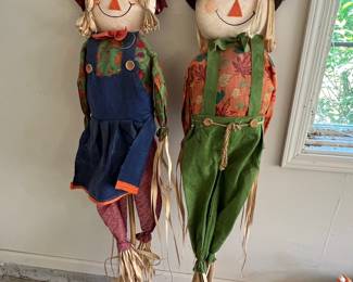 Pair of Standing Scarecrows on Poles