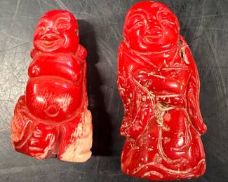 Hand carved red coral Buddha statues