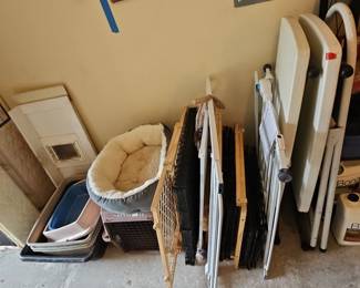 Assorted Pet Supplies and Folding Tables