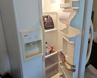 White Kenmore Side-by-Side Refrigerator with Ice and Water Dispenser