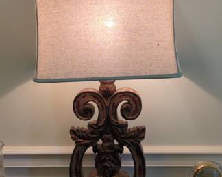 Ornately Carved Table Lamp with Tan Oval Burlap Shade