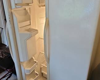 White Kenmore Side-by-Side Refrigerator with Ice and Water Dispenser