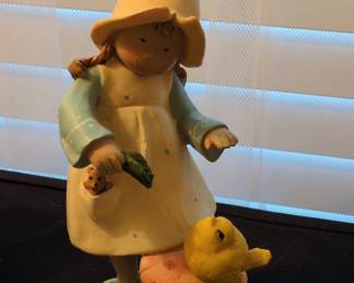 Little Girl with Duck and Teddy Bear Figurine