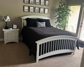 Arched white wood queen bed