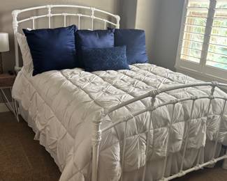 Charming white metal queen bed