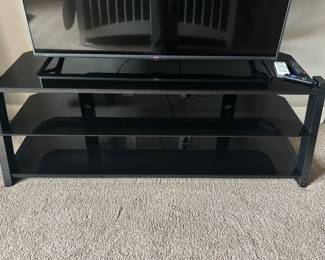Three tier black TV stand
