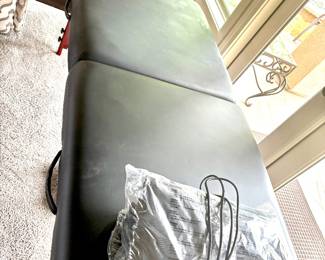 Portable folding massage table