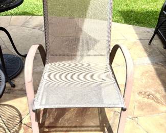 Pair mesh and metal patio chairs