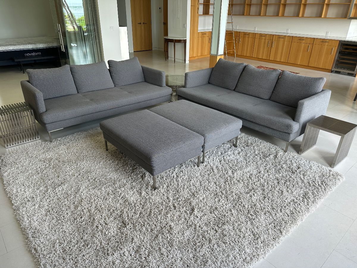 Matching BoConcept sofas with ottomans; sofas 79.5” w x 38” d x 31” t; seat depth 24.5; ottomans 42” l x 27” w  x 16” t; $6,800