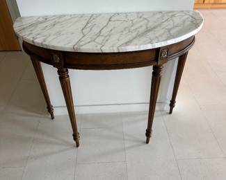 Antique marble topped wall table (38” w, 15 1/2” d, 30” t) $325