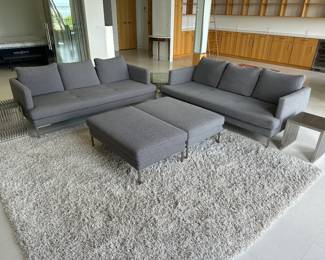 Matching BoConcept sofas with ottomans; sofas 79.5” w x 38” d x 31” t; seat depth 24.5; ottomans 42” l x 27” w x 16” t; $6,800