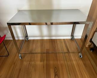 Metal table/ desk (24” x 48” x 29 5/8” tall); $250