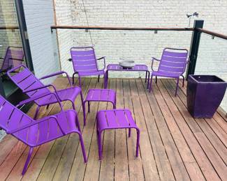 Fermob Luxembourg low outdoor metal chairs with side table and two ottomans; set of 7; $2,995; purple pot $30